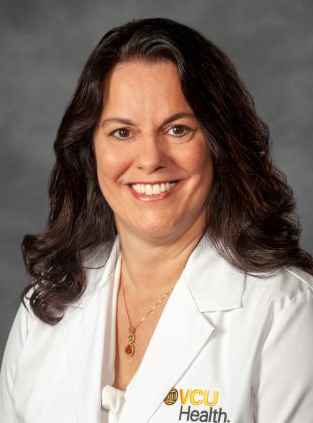 Laura Carucci, M.D.,